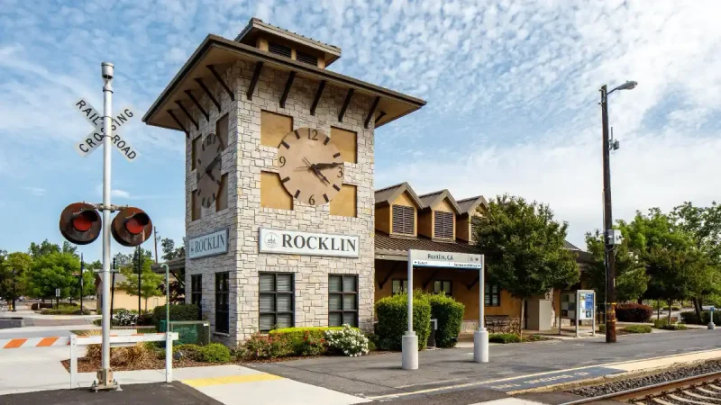 A daytime shot of the Rocklin, CA train station building, a local landmark that represents the service area for Horizon Fence & Custom Gates' professional fencing and gate installation.